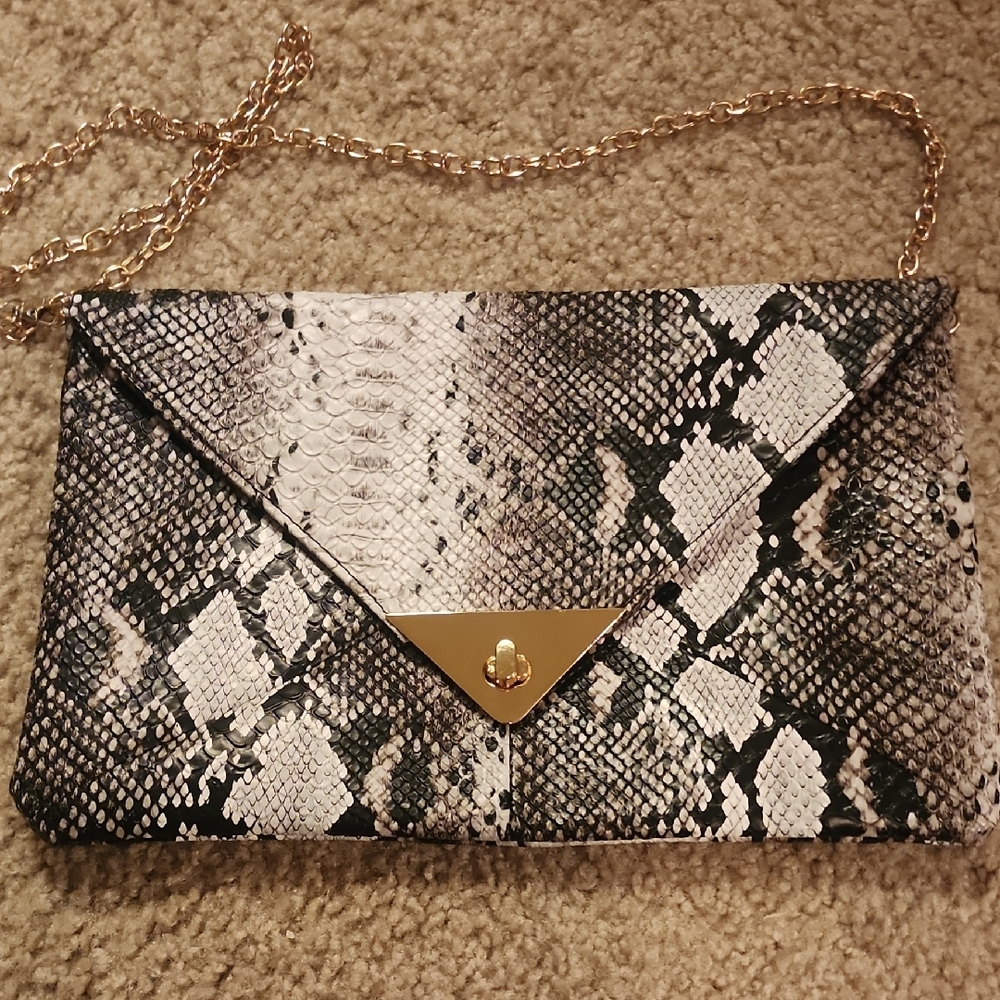 Elegant Snakeskin Clutch with Gold Accents